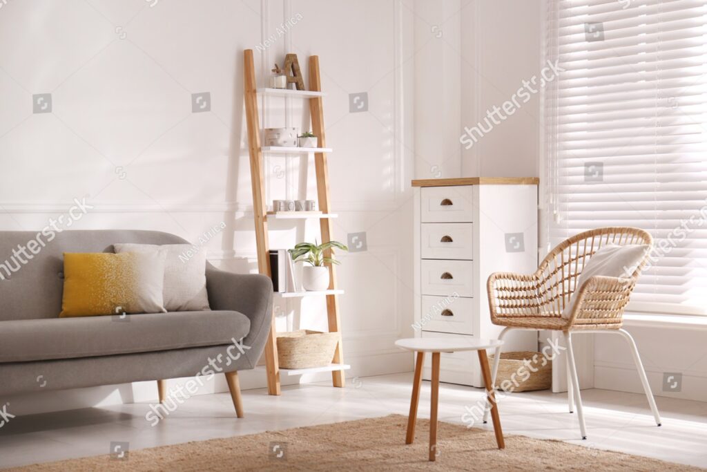 stock-photo-elegant-decorative-ladder-near-sofa-in-living-room-1938510220